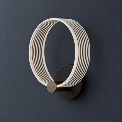 Orla Black and Gold LED Circle Wall Light for Bedsides and Hallways