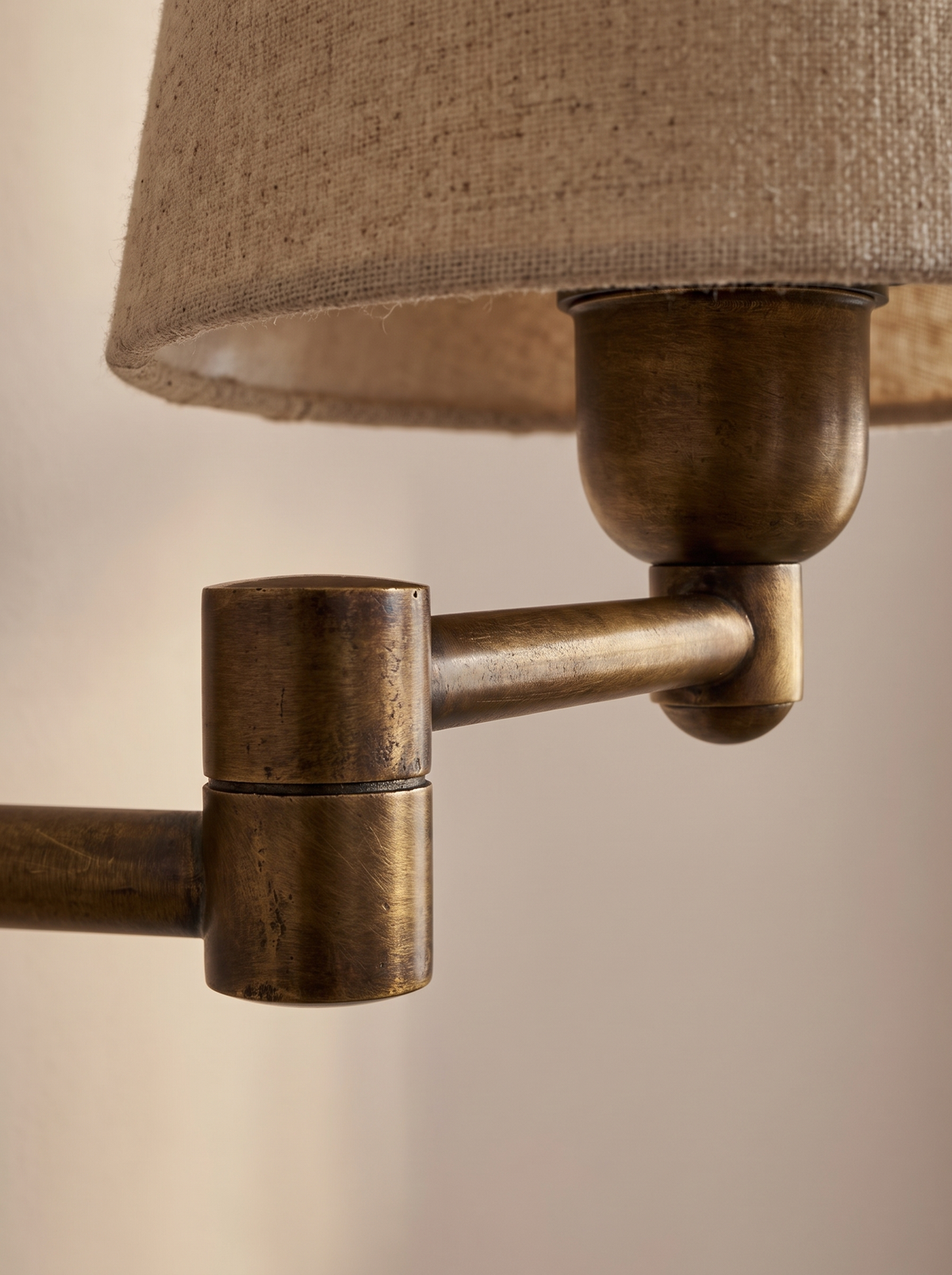 Close detail of the Marlow antique bronze swing arm