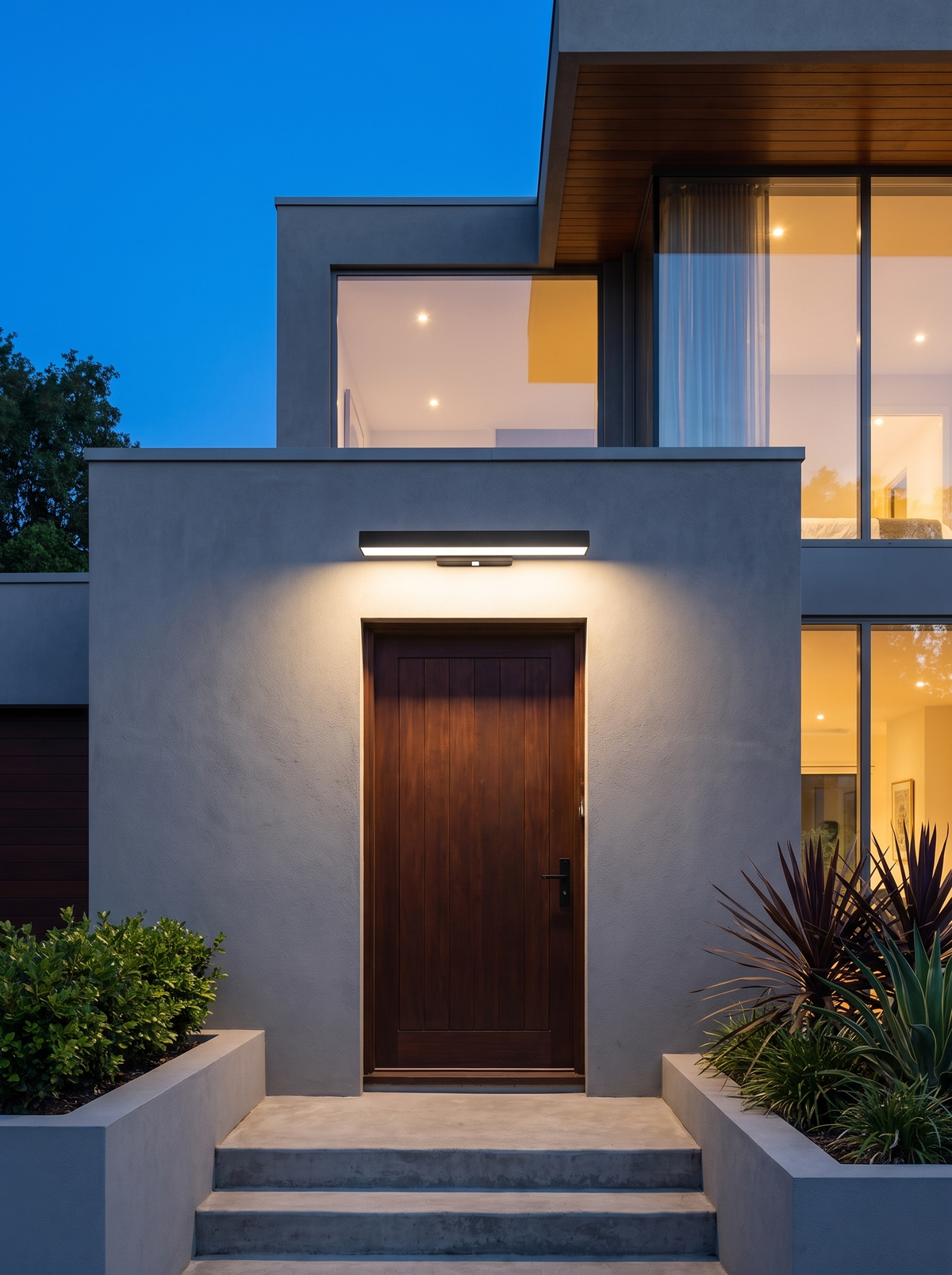 Verano rectangular wall light above a timber front door