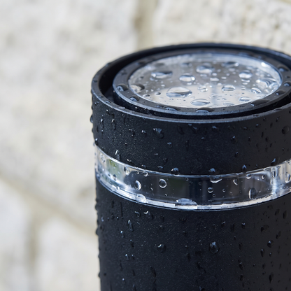Close detail of the Northfield black aluminium housing with rain beads