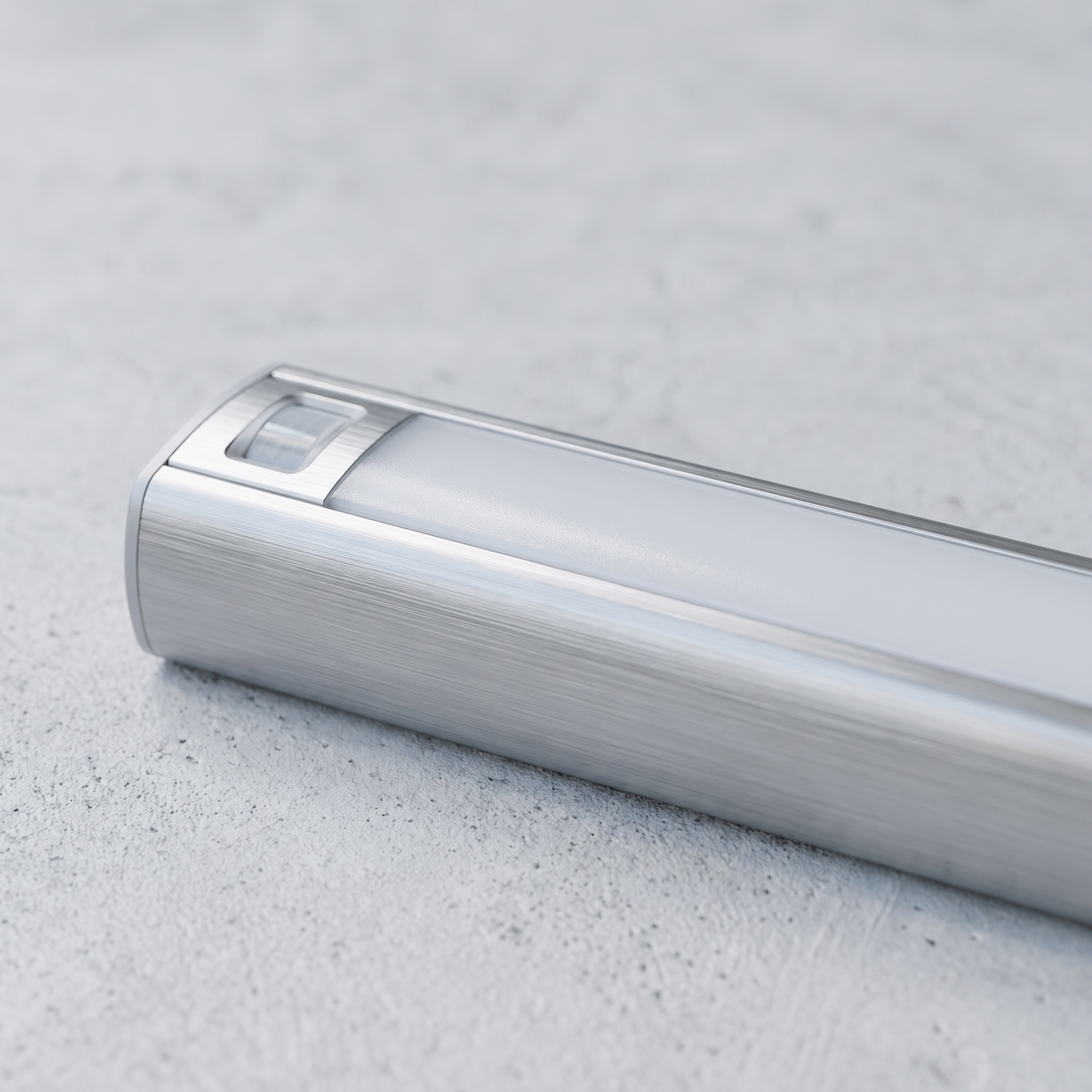 Close detail of the Halden brushed aluminium housing and sensor