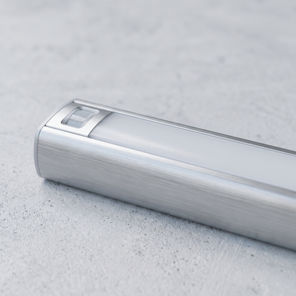 Close detail of the Halden brushed aluminium housing and sensor