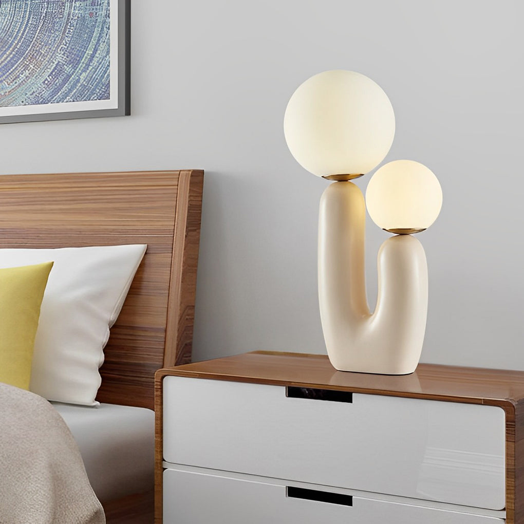 Glass cactus lamp glowing warm white