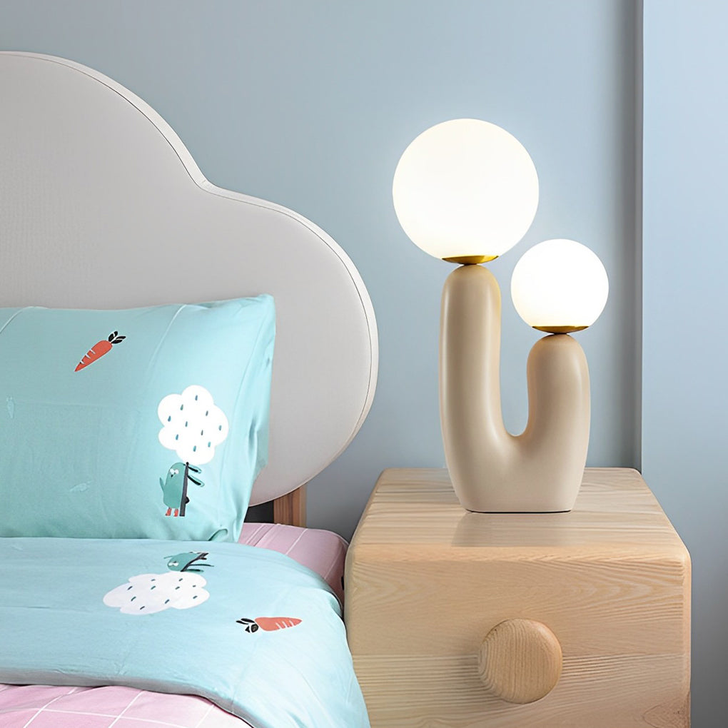 Cactus accent lamp on a side table